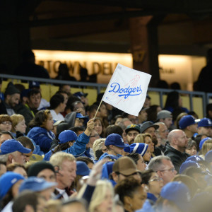Dodgers Fan Waving Dodgers Flag. photo: Jon SooHoo